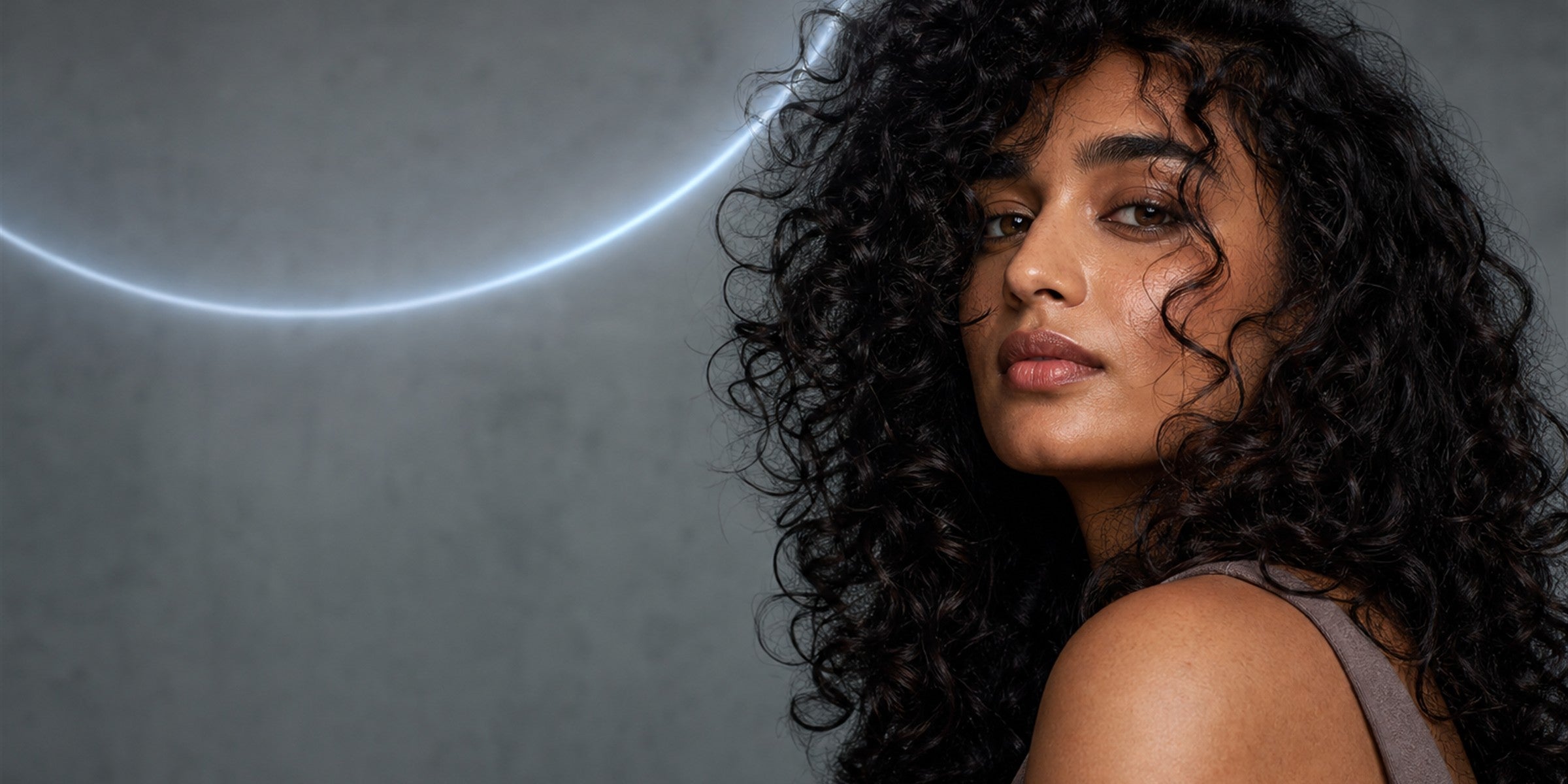 Defined natural curl, hydrated and flexible