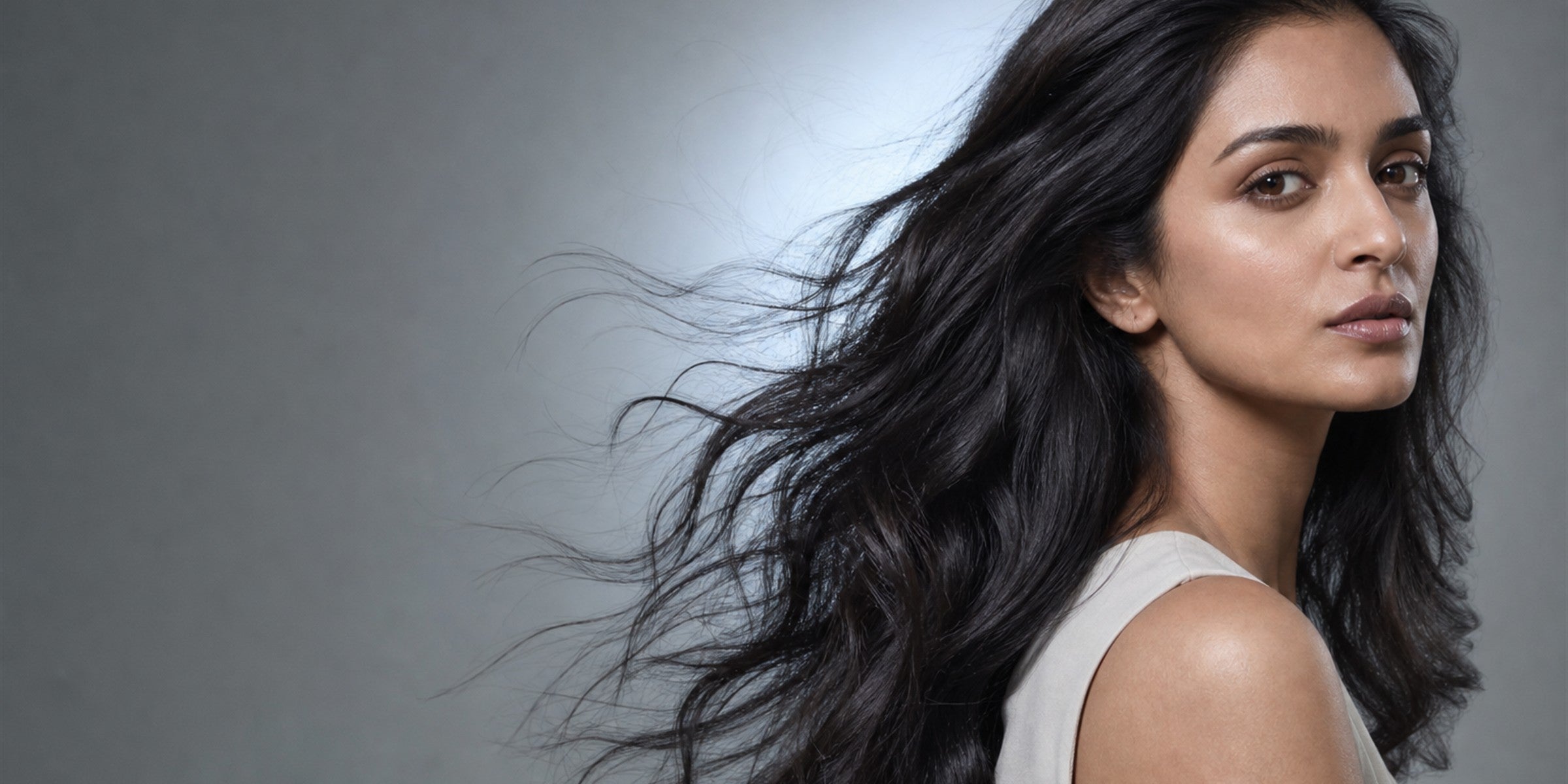 Fine hair lifted into a fuller, airy fan